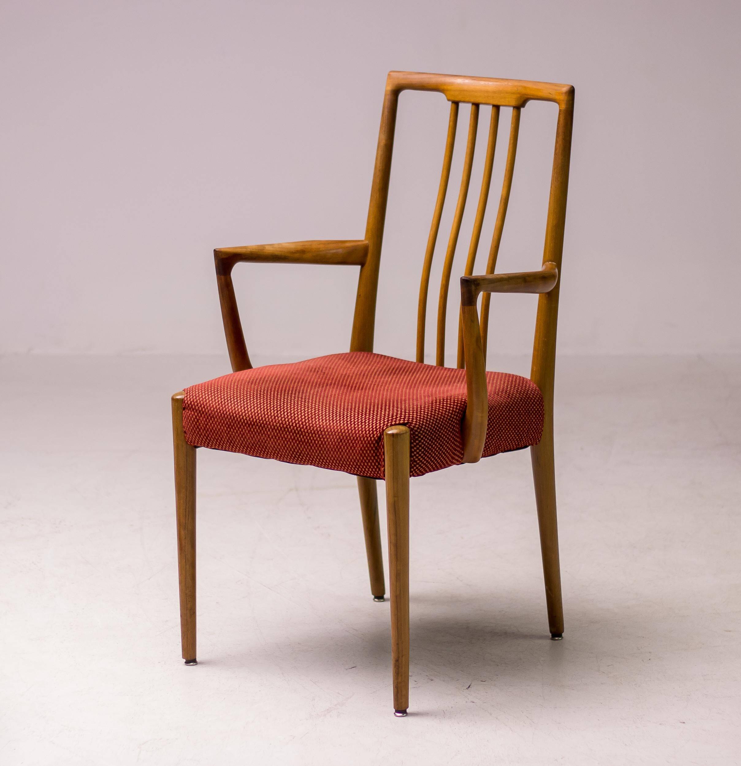Set of six carved walnut dining chairs, Italy, 1955