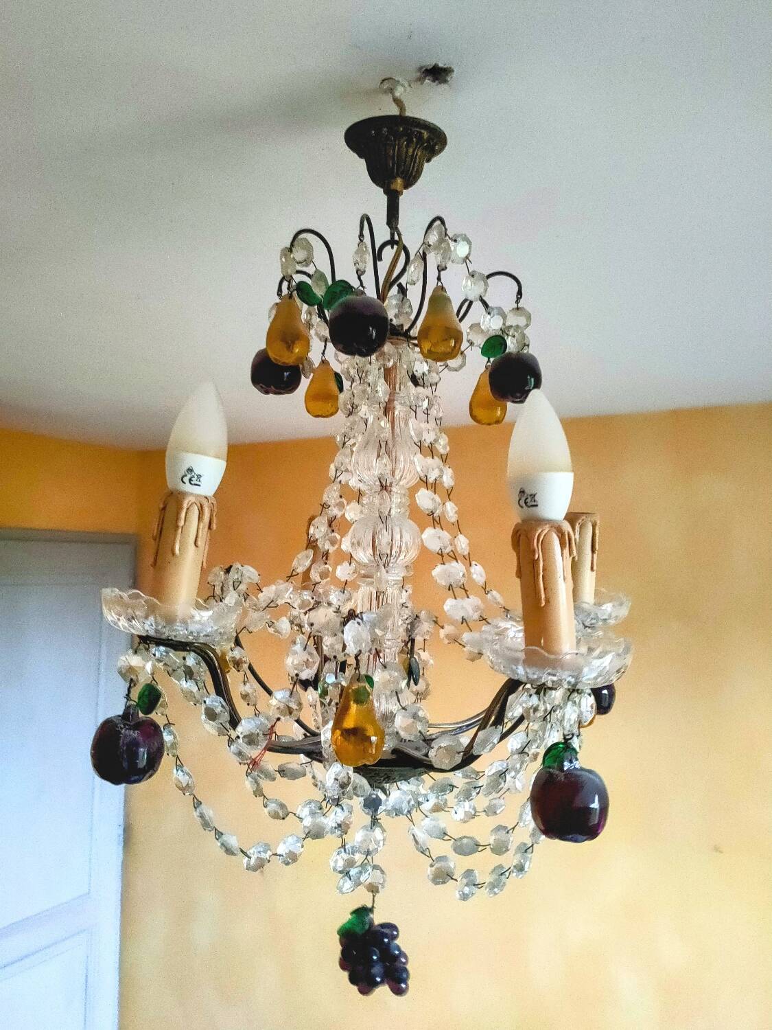 Golden bronze chandelier with fruit pendants