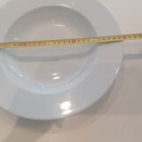 Set of 11 hollow porcelain plates