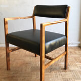 Chair in light teak and black skaï from the 1960s
