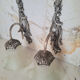 Pairs of Art Deco wall lights, antique fixtures.