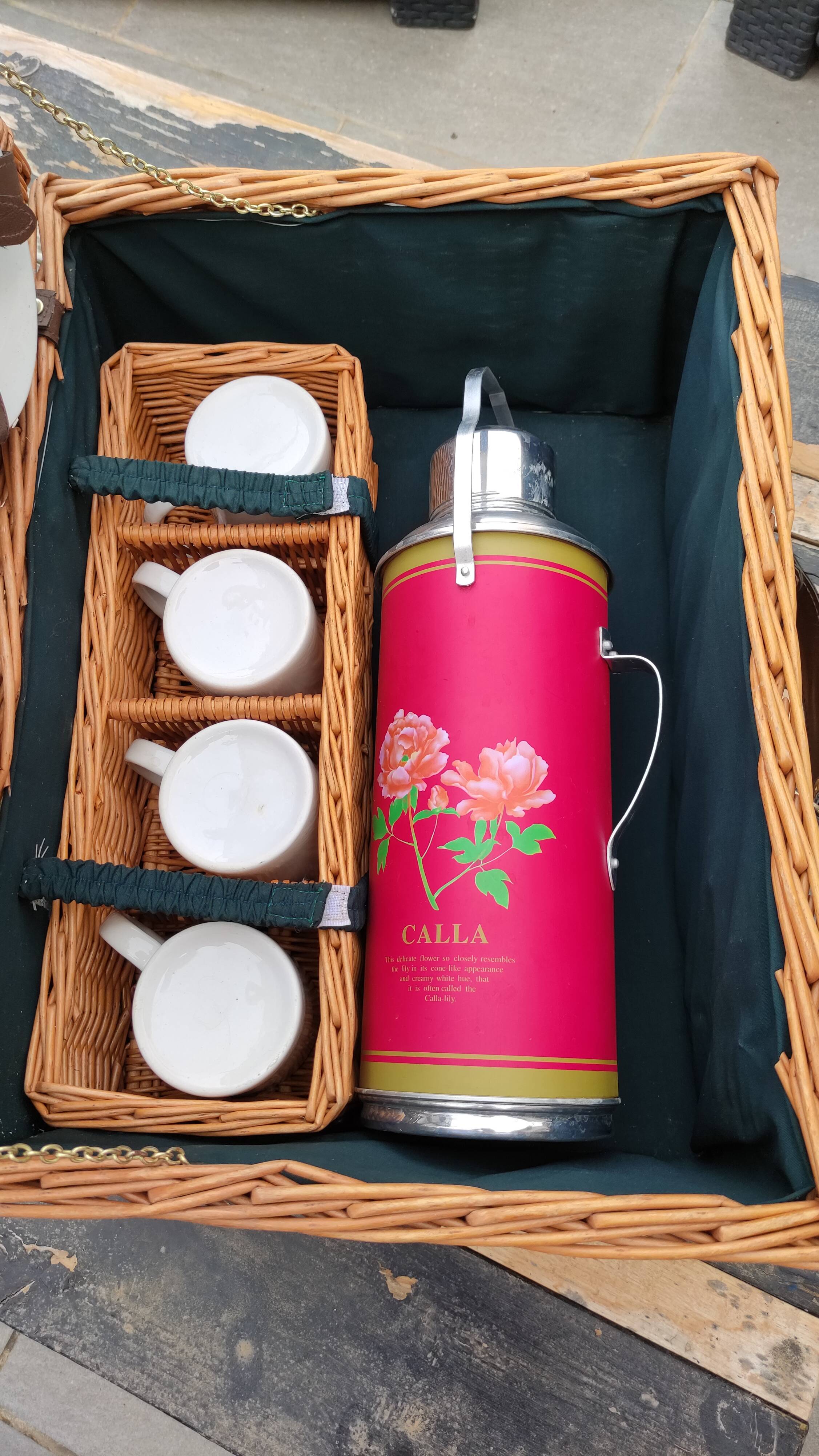 Picnic basket with white porcelain crockery