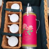 Picnic basket with white porcelain crockery