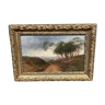 Oil on wood framed with a landscape, gilded frame.