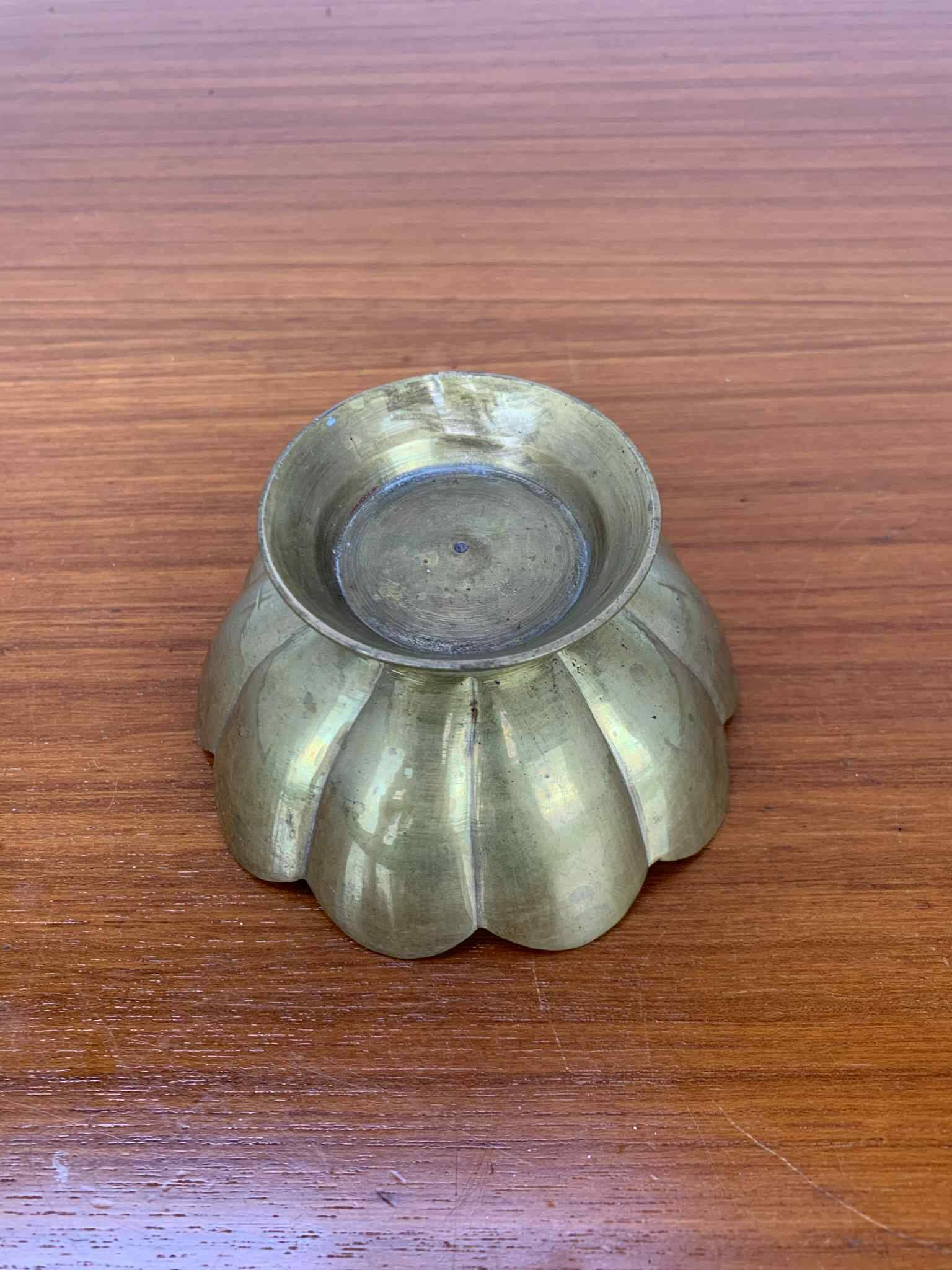 Vintage gold-plated brass flower emptier