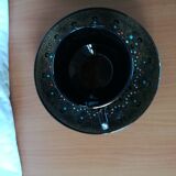 Black cups and saucers with relief decoration