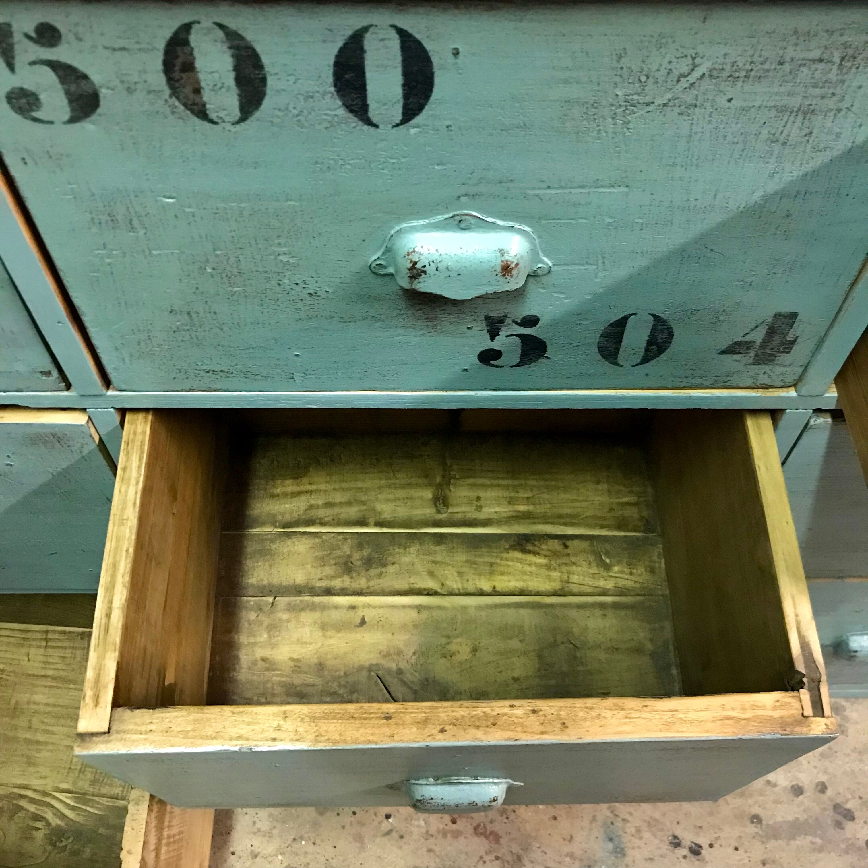 Furniture of metier enfilade with restored wooden drawers