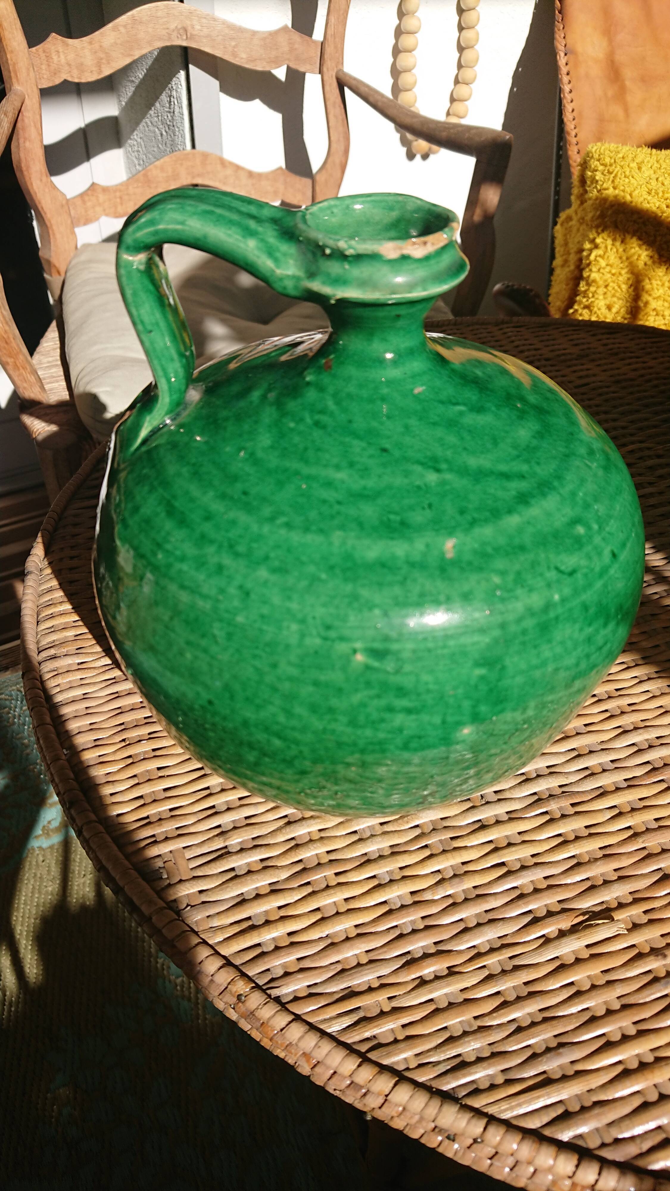 Green enamelled sandstone jug