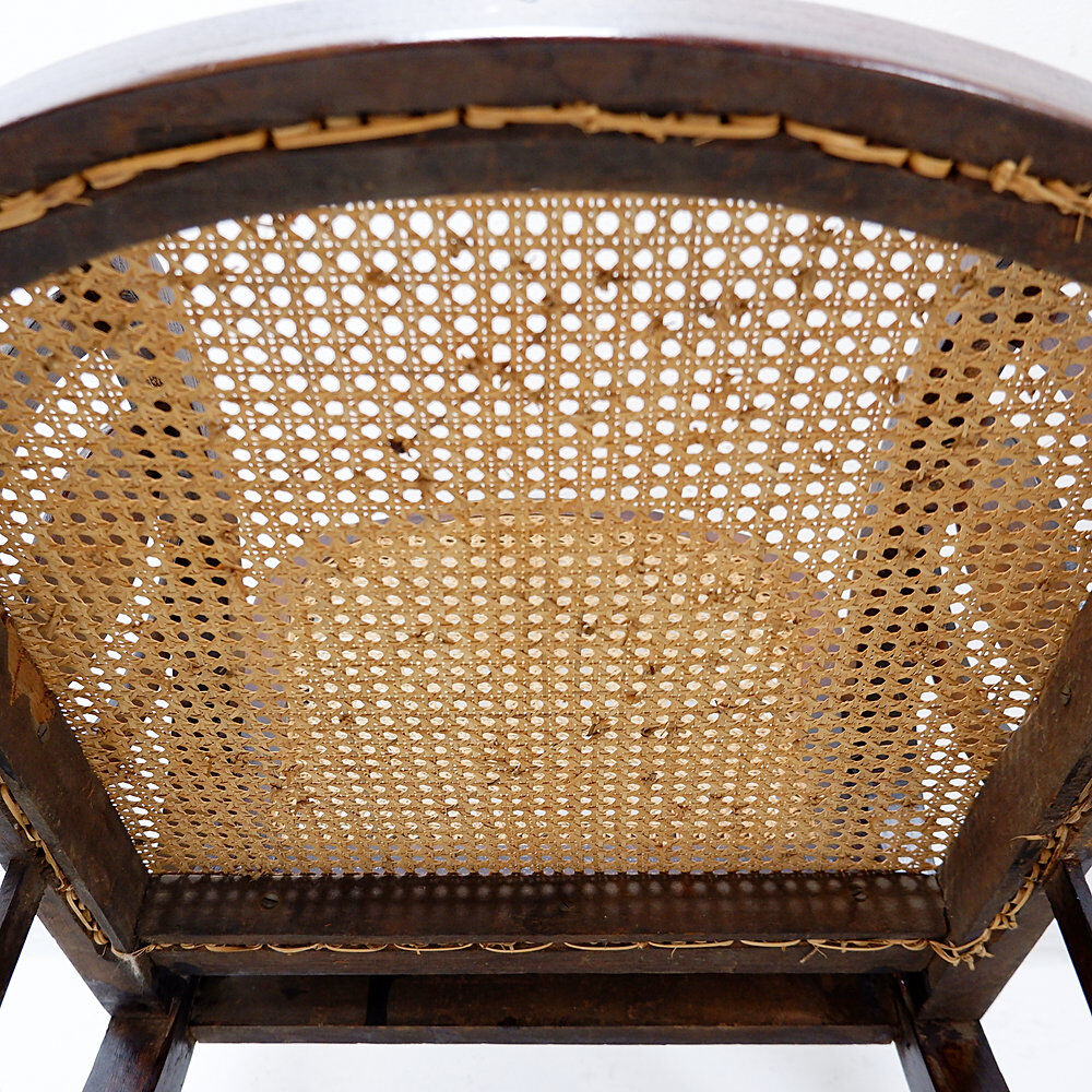 Art Deco armchairs in wood, with cane seat and backrest, circa 1930.