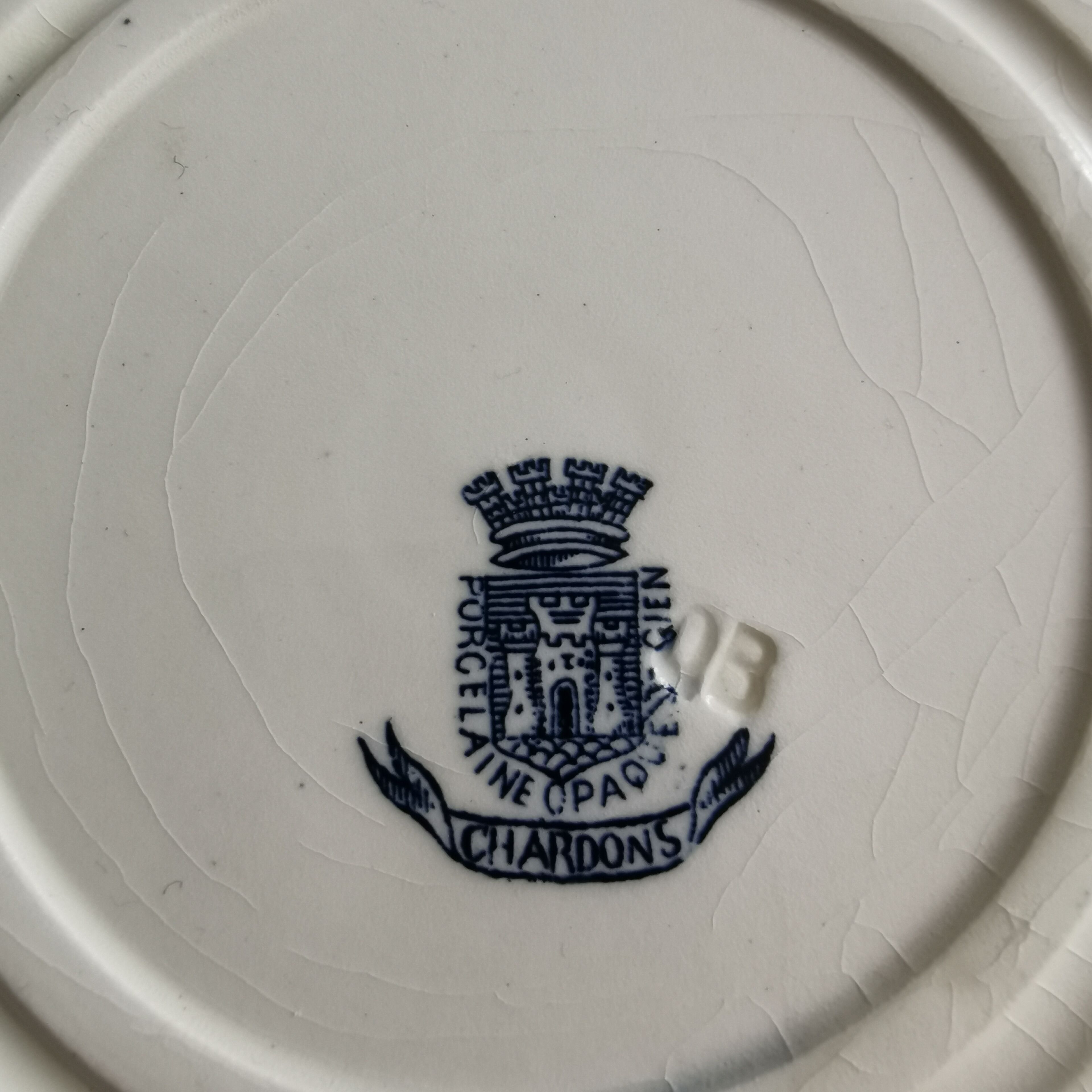 Flat plates stamped opaque Gien porcelain, “Chardons” model