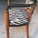 Art deco armchair with zebra tapestry