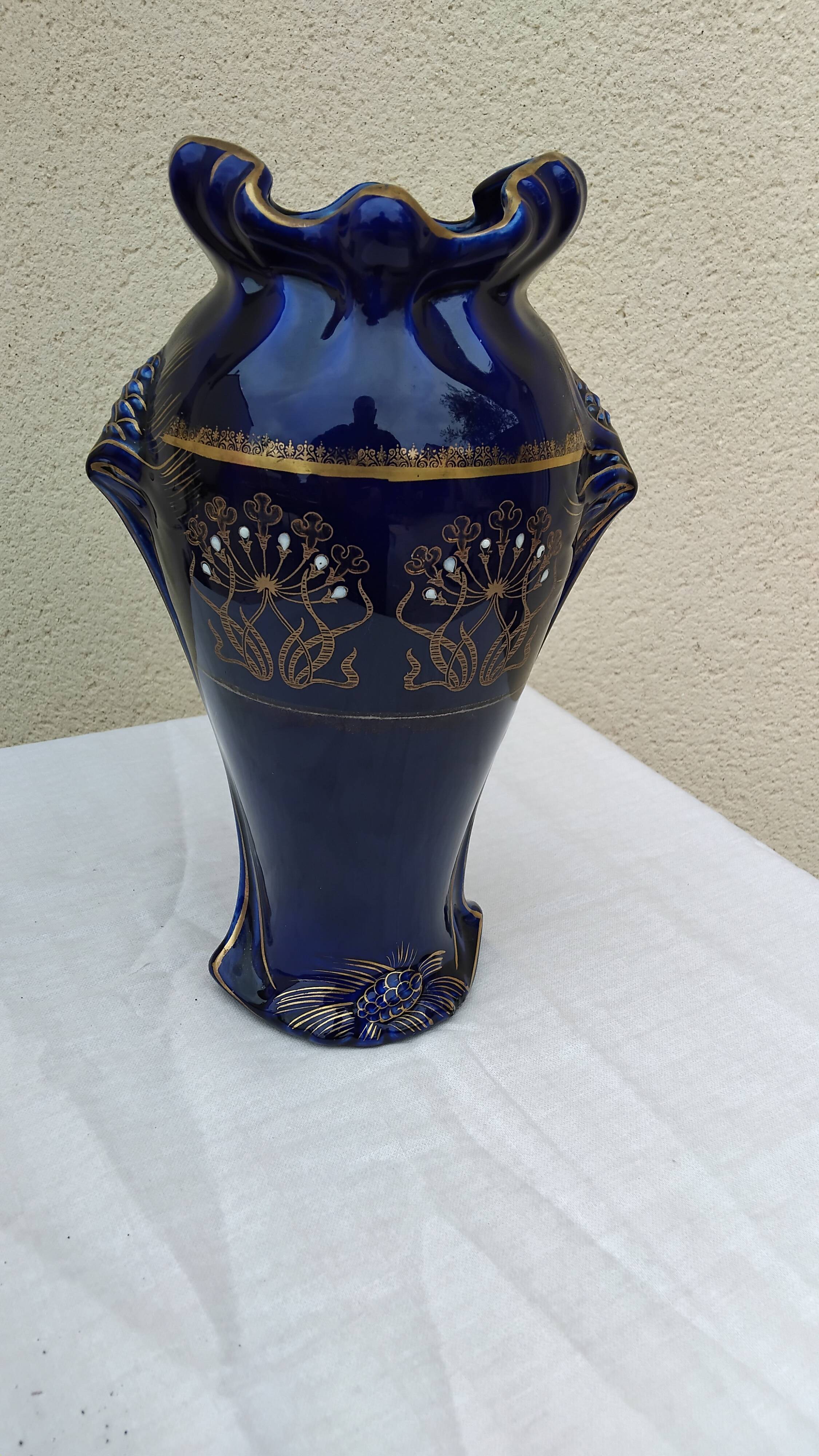 Large antique blue earthenware vase