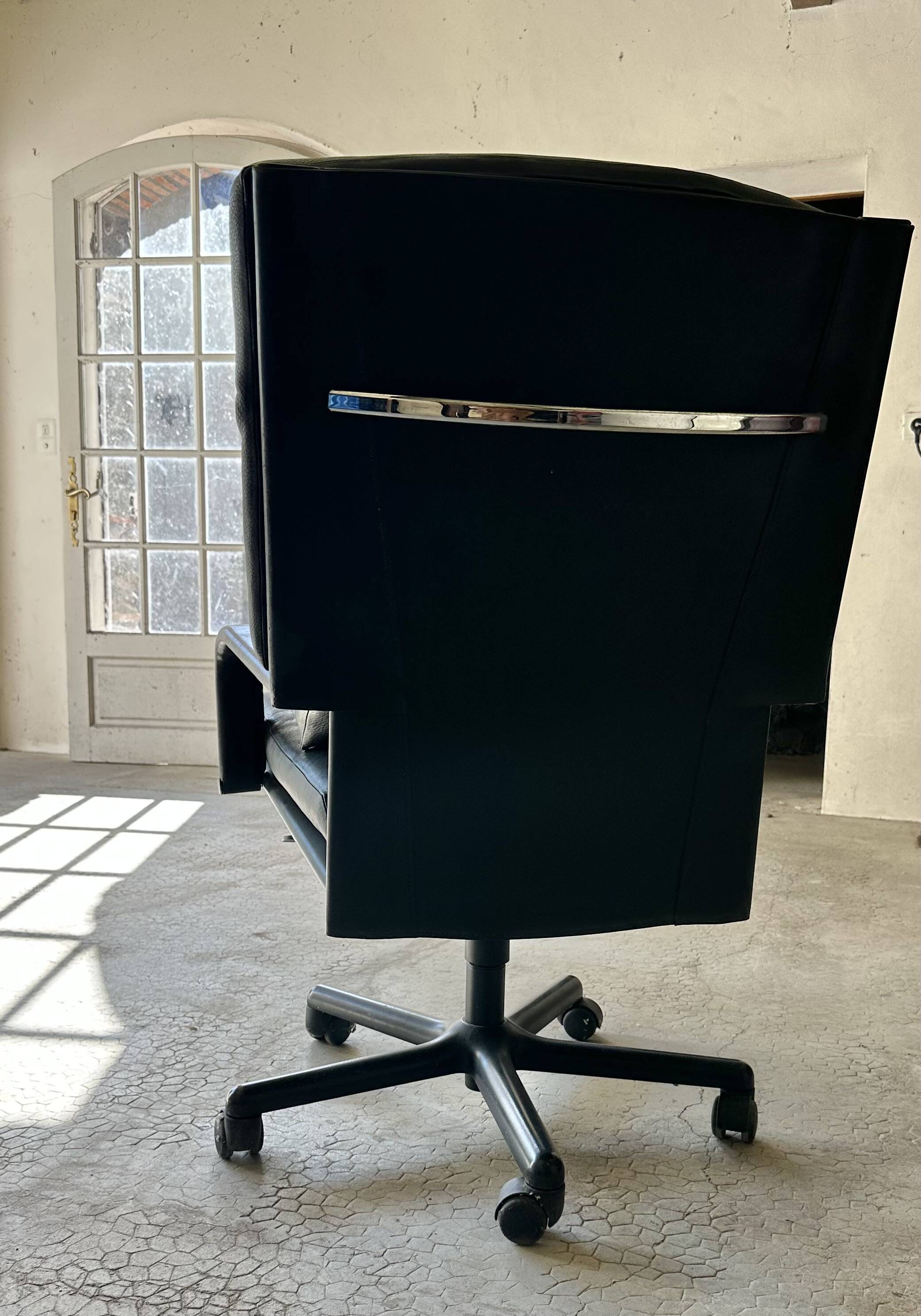 Executive desk by Guido Faleschini and armchair by Matteo Grassi