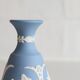 Blue porcelain vase by Wedgwood.