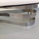 Vintage oval coffee table in smoked glass and chrome metal from the 1970s.