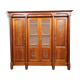 Empire library in cherry tree with blonde patina and gilded bronze around 1950