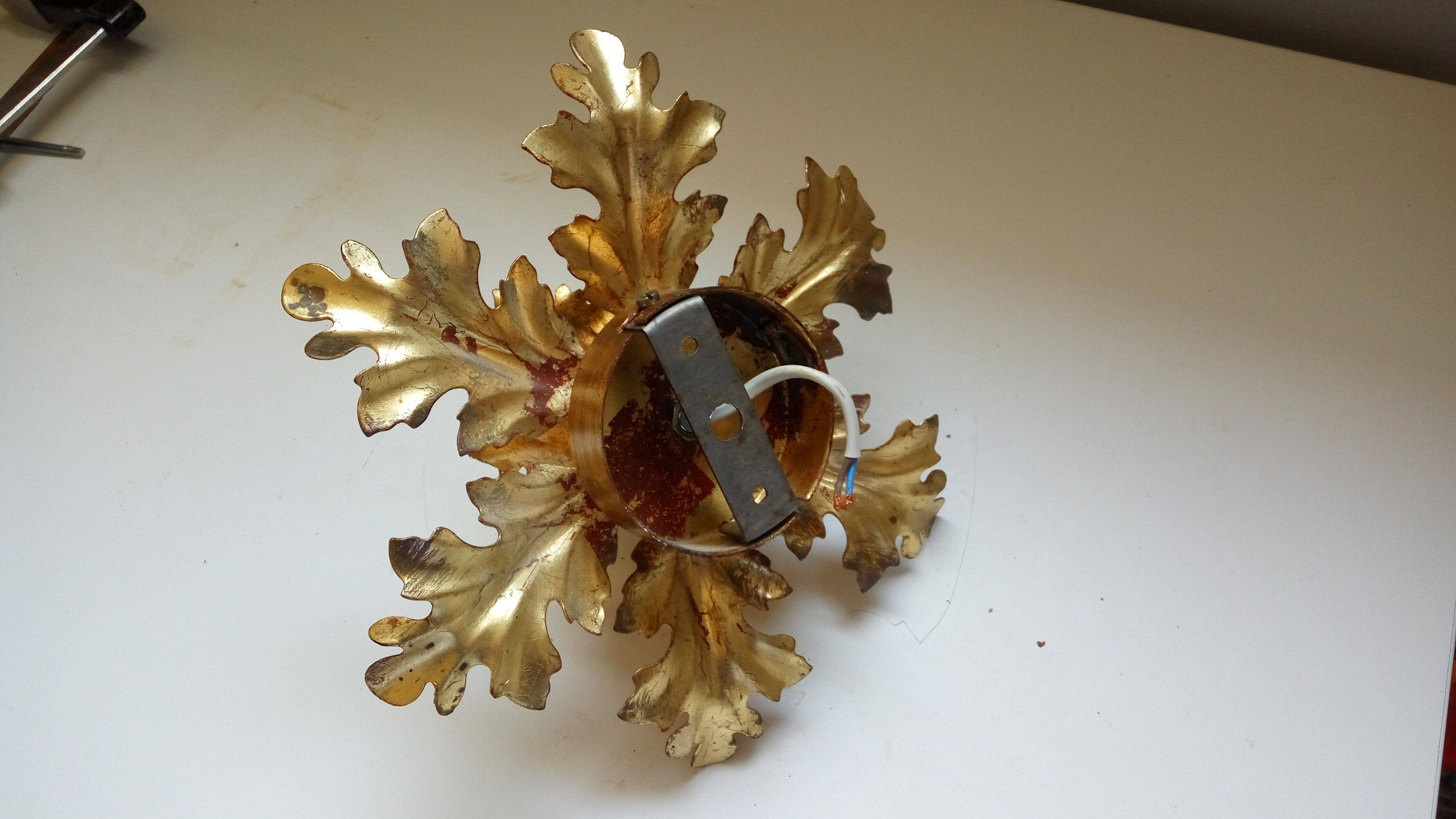 Golden metal wall light