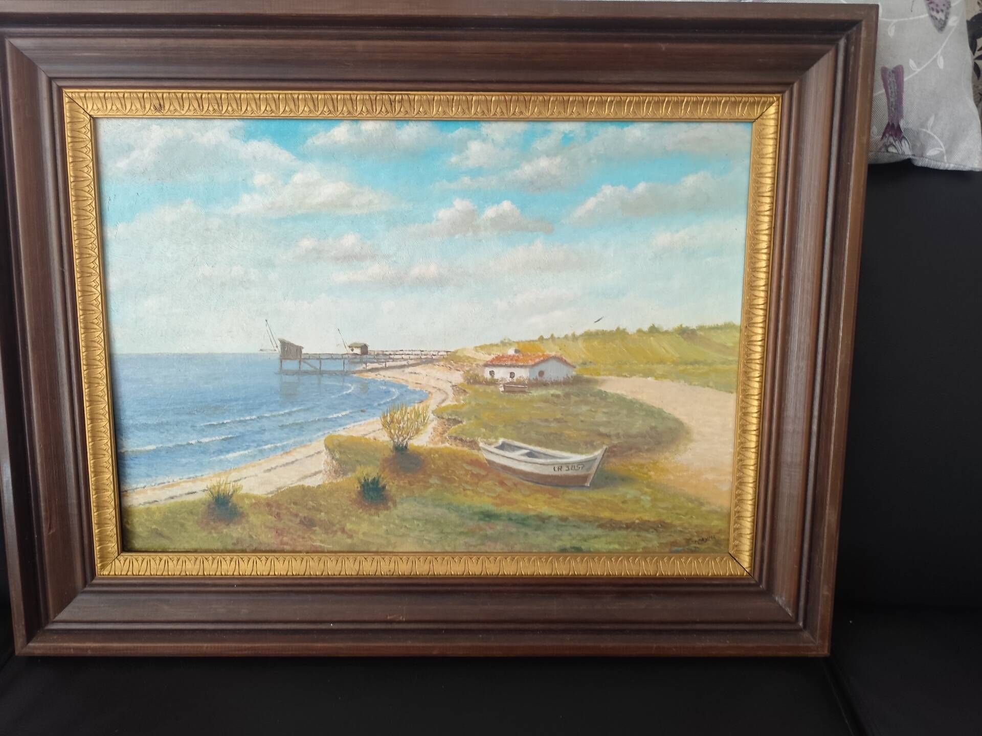 Beautiful painted picture depicting a seaside landscape.