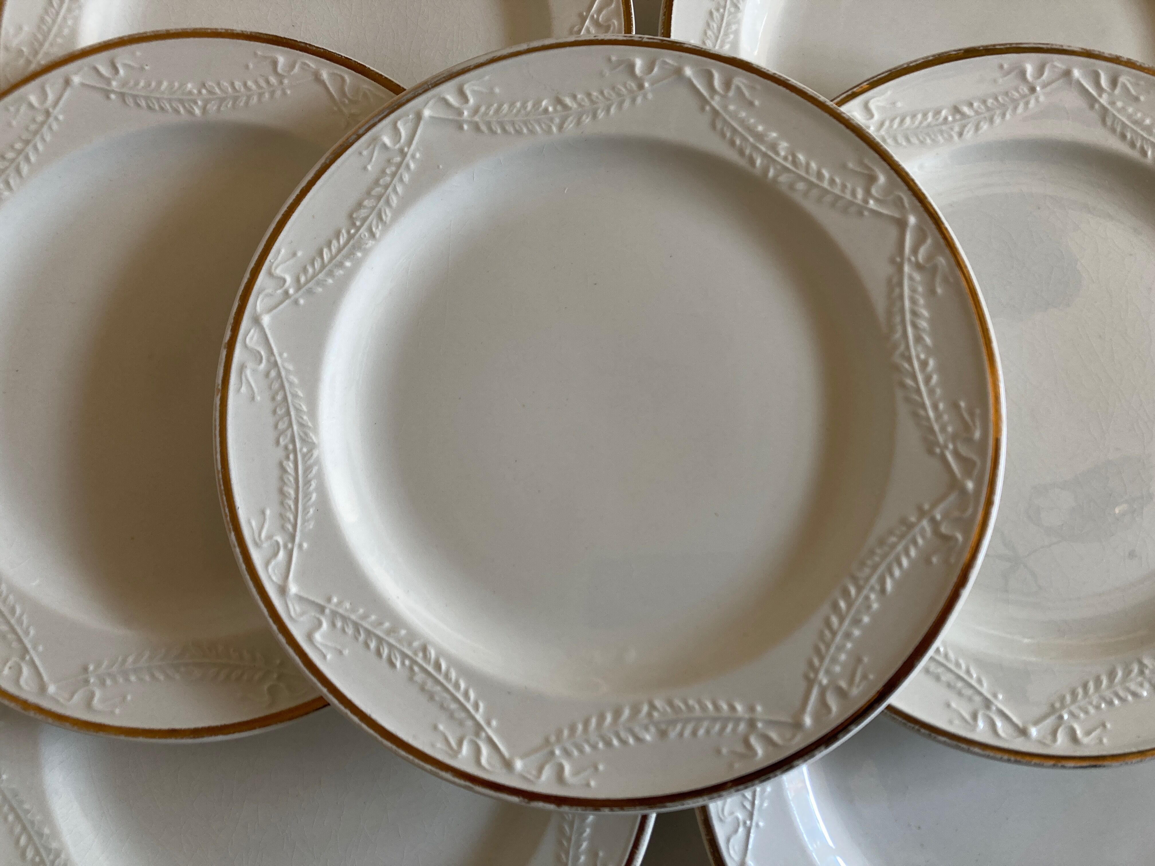 Set of 7 neo-classical plates directoire fine earthenware from Gien 19th