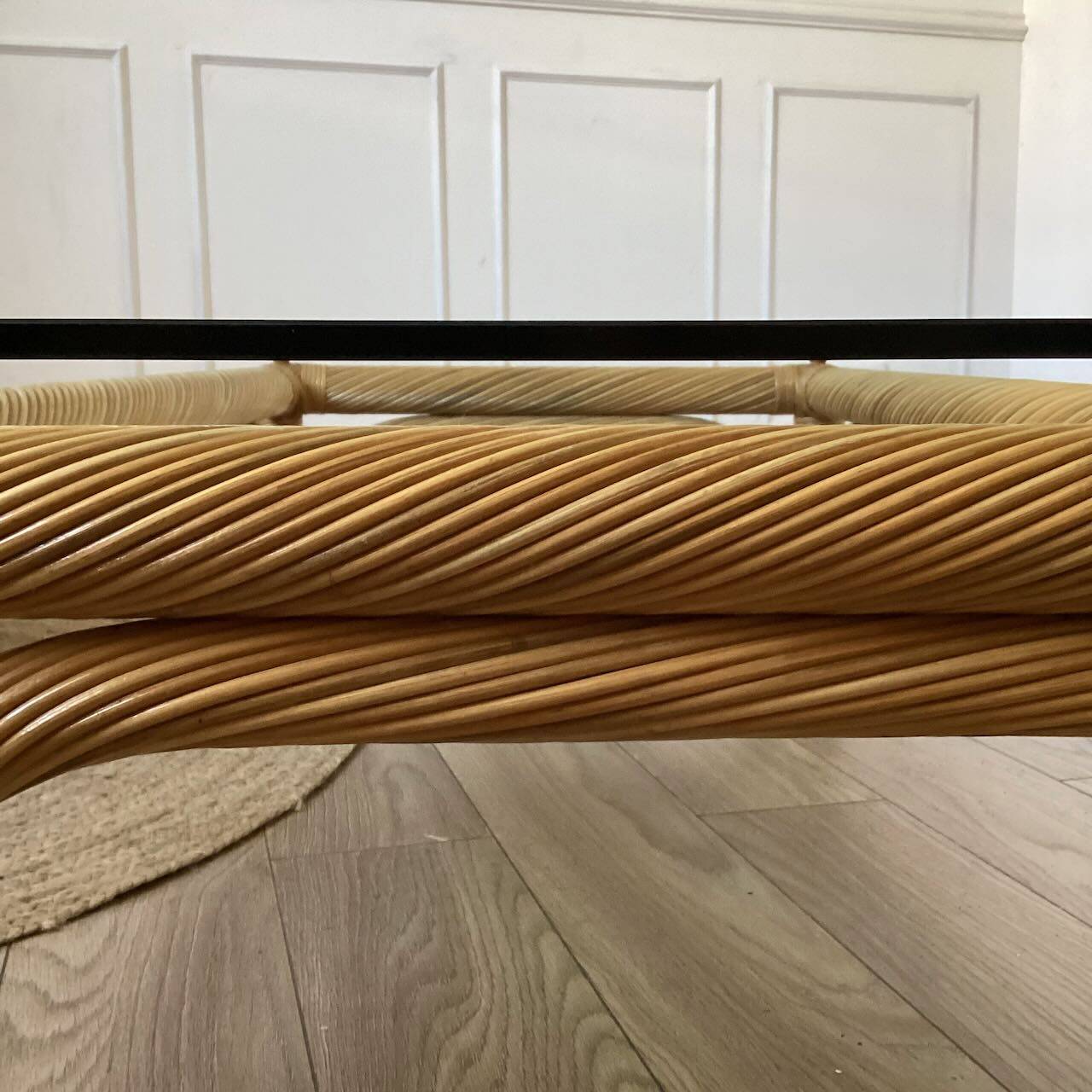 Large rattan and glass coffee table