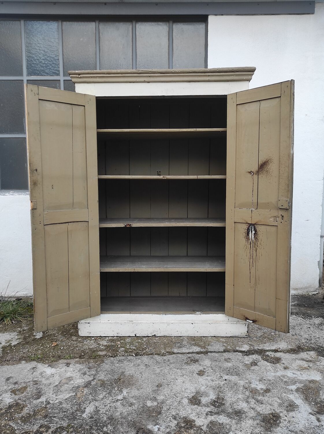 Old rustic Parisian wardrobe patinated in oak and fir