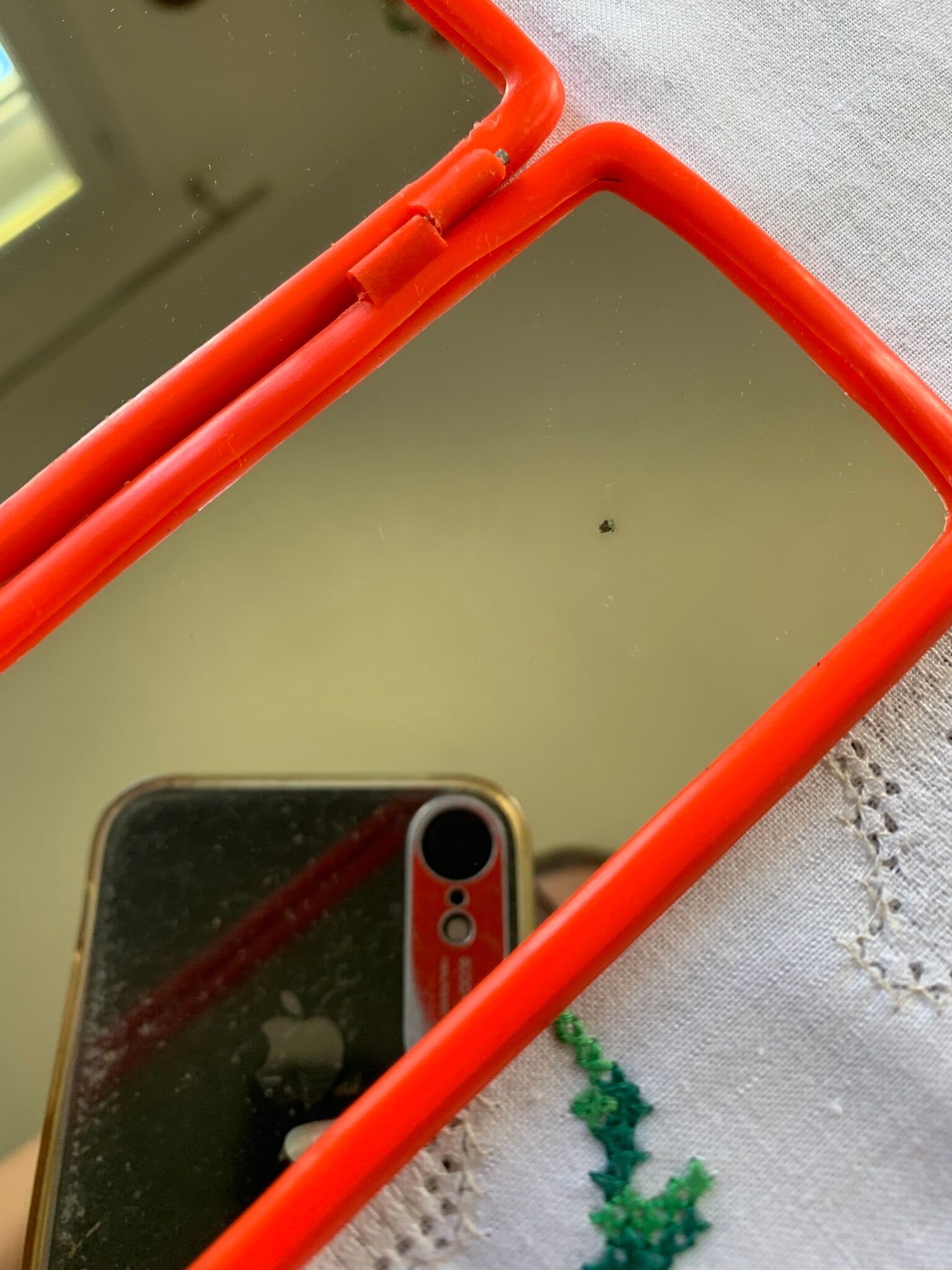 Orange plastic triptych mirror