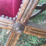 50s footrest in red velvet and scuplented wood