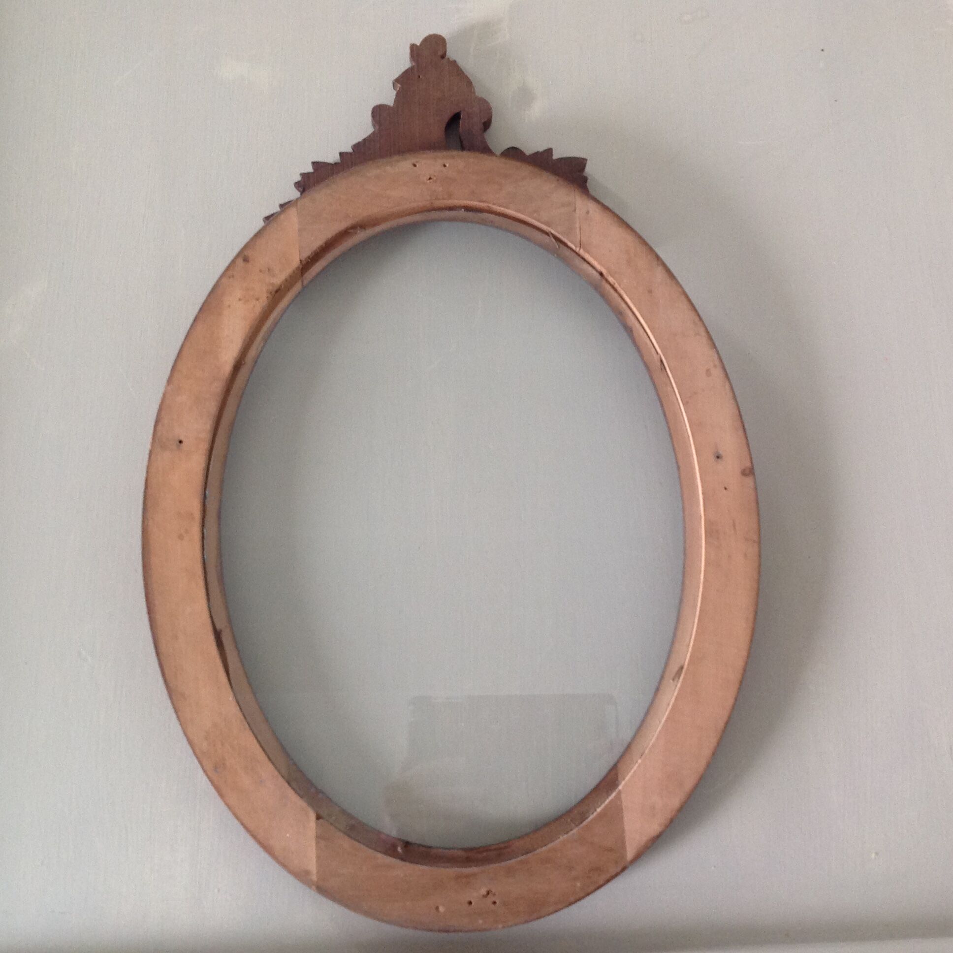 Wooden oval frame