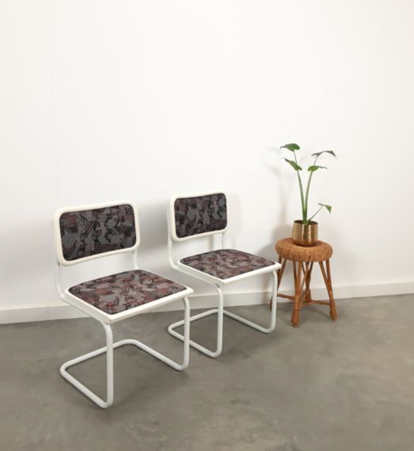 Pair of vintage tubular frame dining chairs