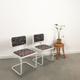 Pair of vintage tubular frame dining chairs