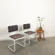 Pair of vintage tubular frame dining chairs