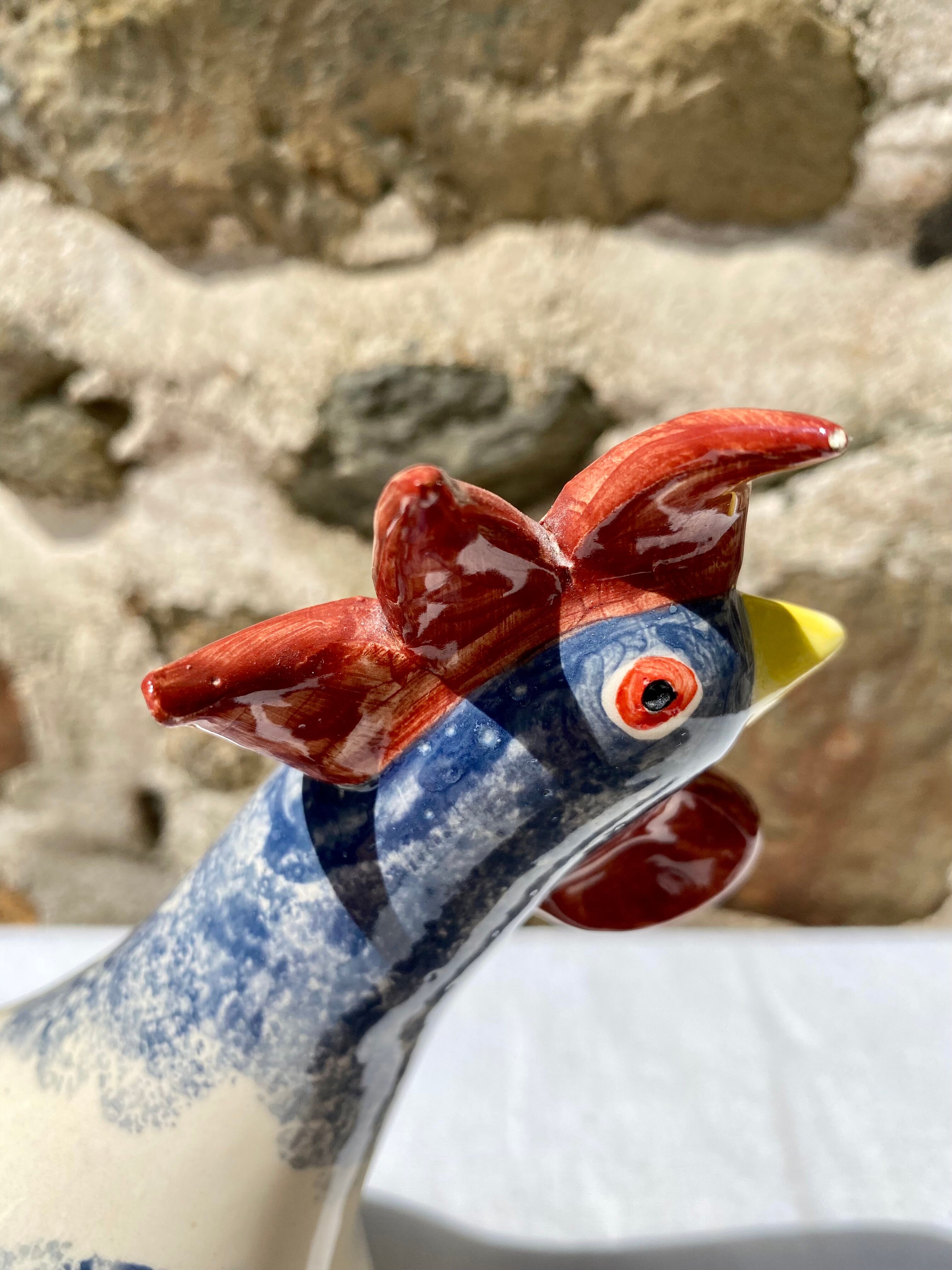 Signed ceramic hen and guinea fowl