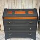 Wooden and black secretary desk