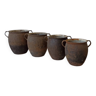 Old cast iron cookware. Flower pots. Set of 4 pieces.