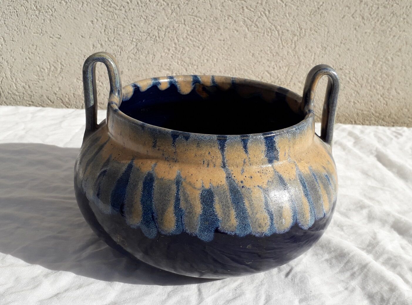 Signed stoneware pot cover