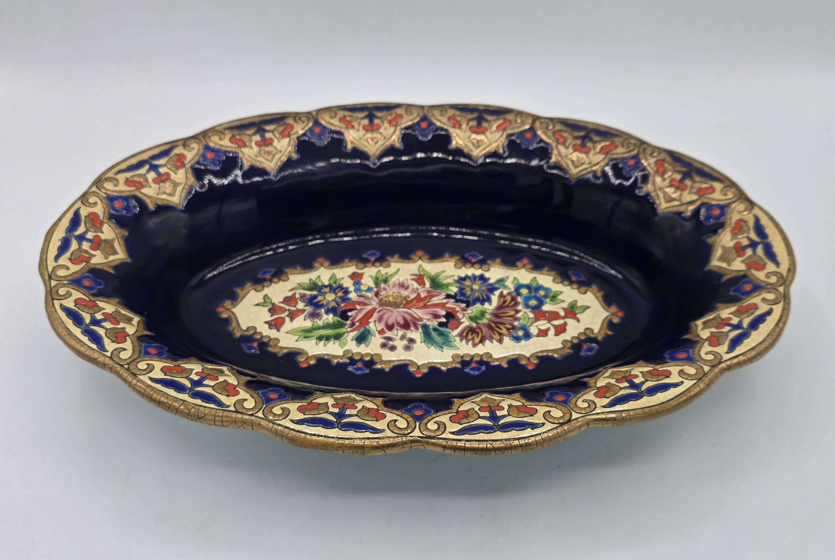 Oval dish in glazed earthenware by M. P. Chevallier, Manufacture des Émaux