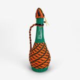 High glass bottle and braided scoubidous threads
