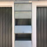 Clamshell cabinet
