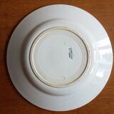 Old plate with wreath decoration