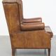 Sheepskin wingback chair in good condition