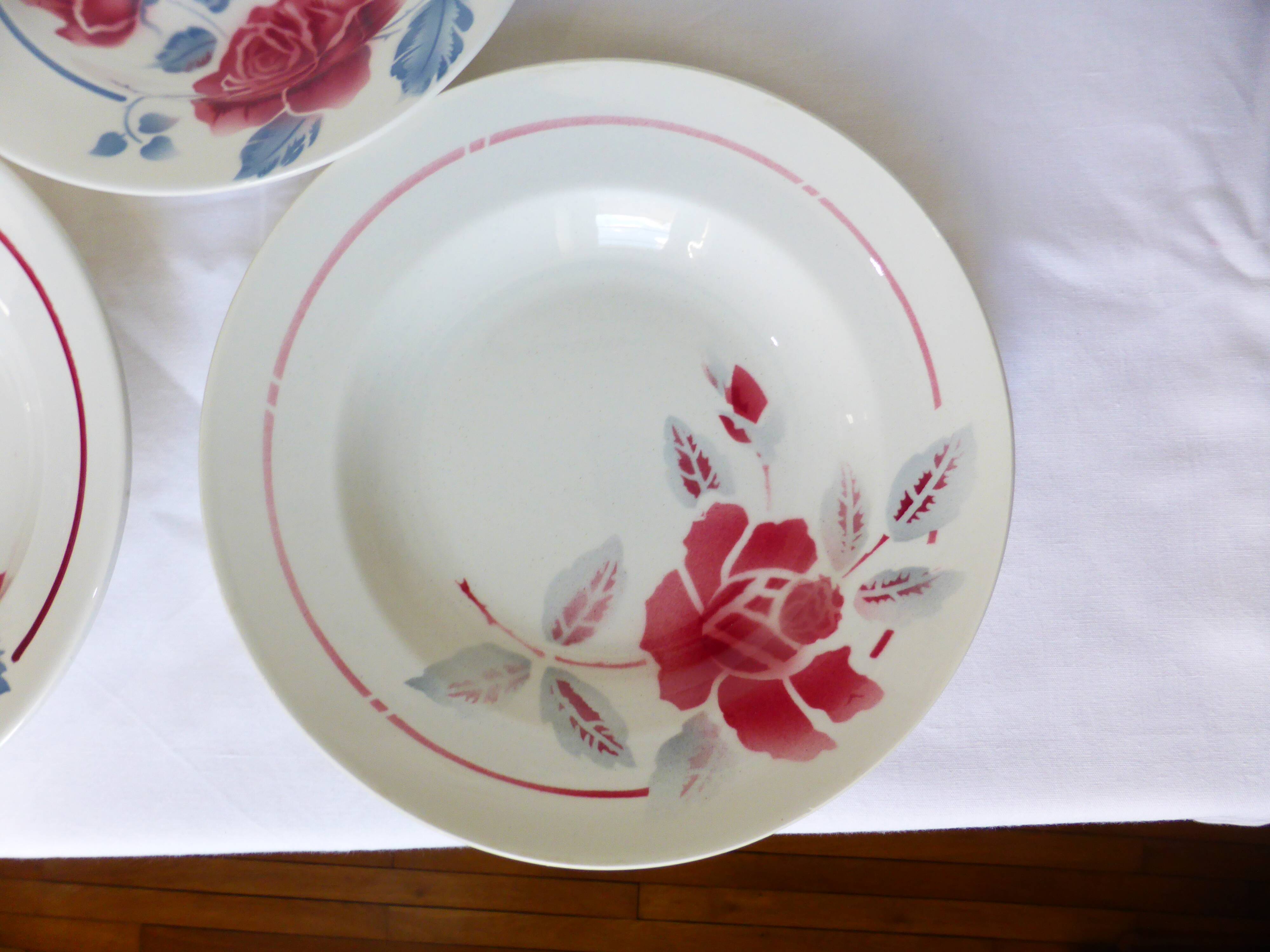 3 vintage soup plates in a jumble