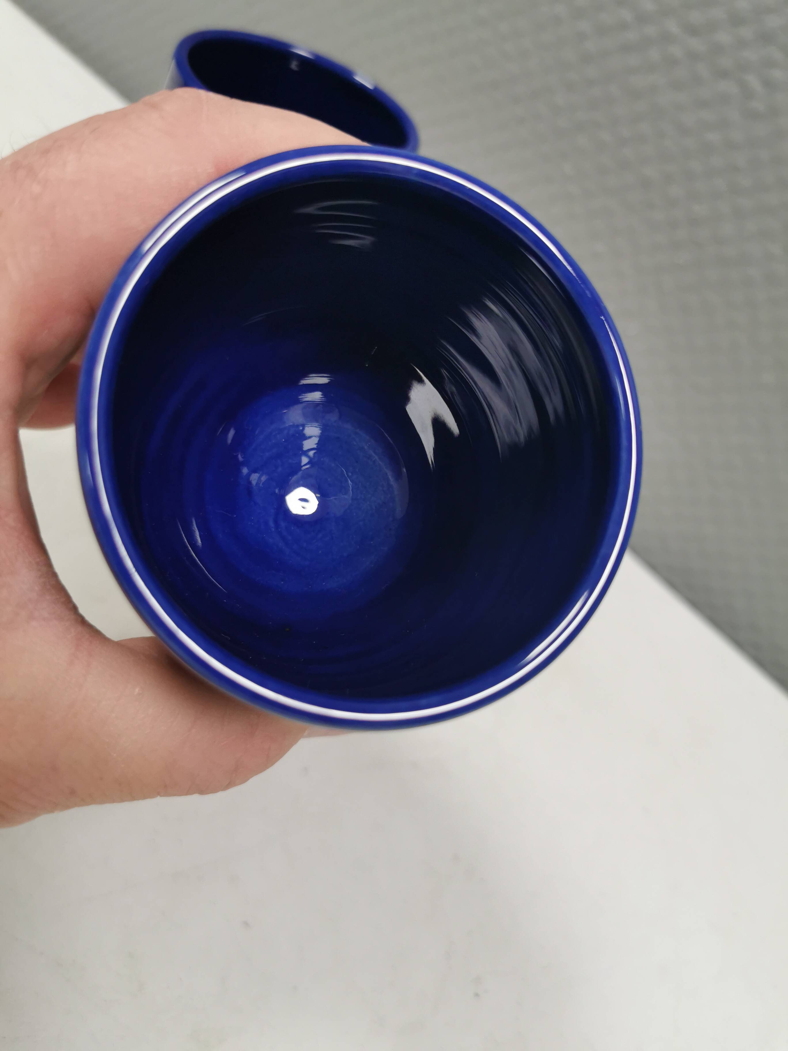 Two mugs in partially blue-glazed ceramic, from Seilast Wisby Sweden