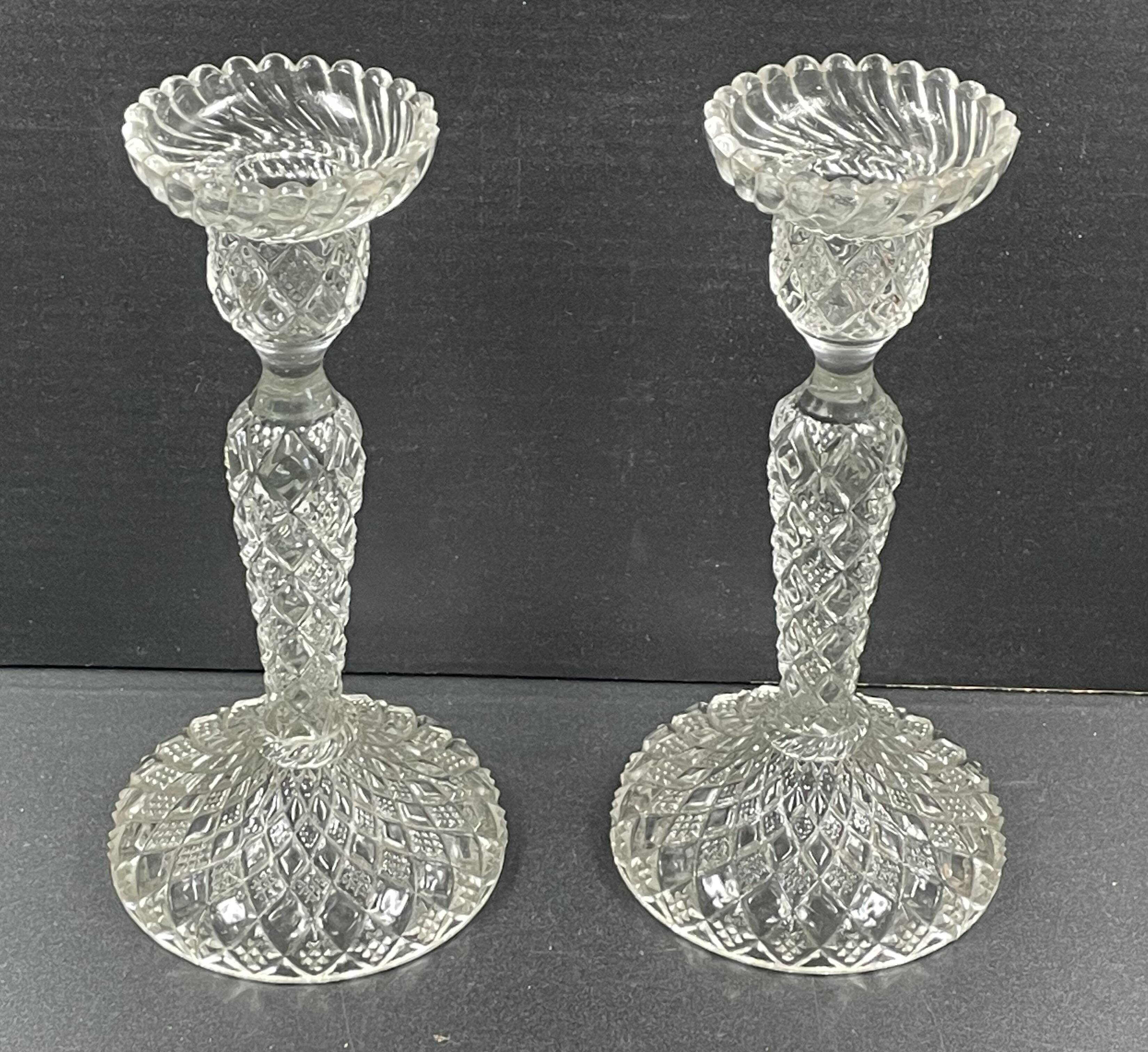 Pair of candle holders in molded glass