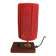 Small lamp made of wood, brass, and wool.