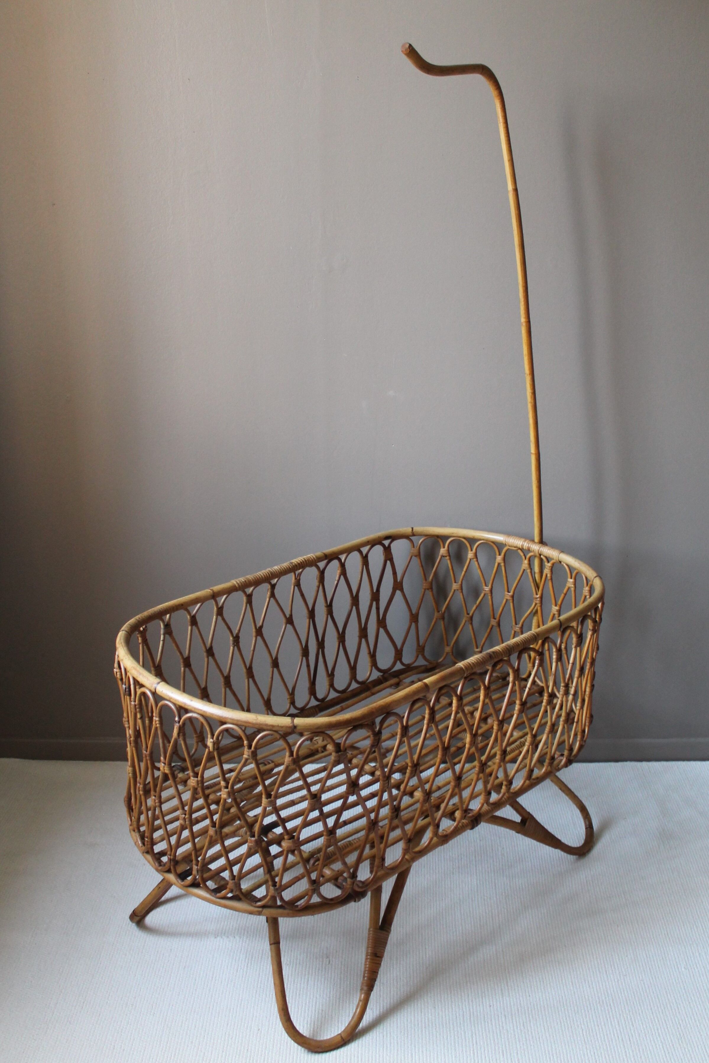 Vintage rattan cradle