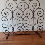 Grille de cheminée en fer forgé