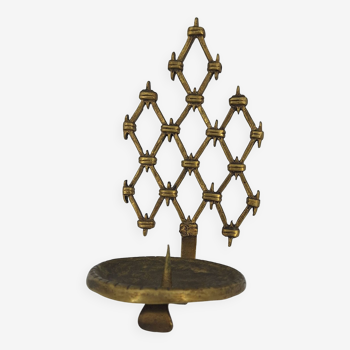 Brutalist bronze wall-mounted candle holder with openwork braces around 1970