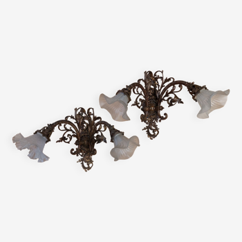 Pair of double Art Nouveau sconces in wrought iron with bronze patina