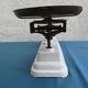 White enamelled cast-iron roberval balance
