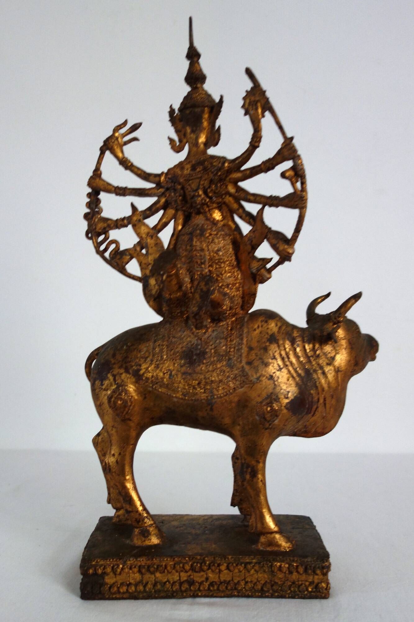 Golden bronze statue of Shiva on Nandi, India, mid-20th century.